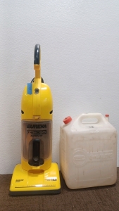 Eureka Vacuum & 5 Gallon Plastic Tank.