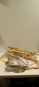 (1) Pile of Hangers and (1) Pile of Costume Jewelry