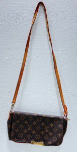 (1) Louis Vuitton Shoulder Bag With Red Interior