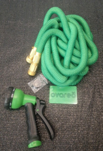 (1) 50-Foot Garden Hose W/ Hand Sprayer & (1) Box Of Assorted Amazon Overstock