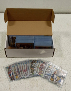 (1) Box of Sports Cards In Toploaders
