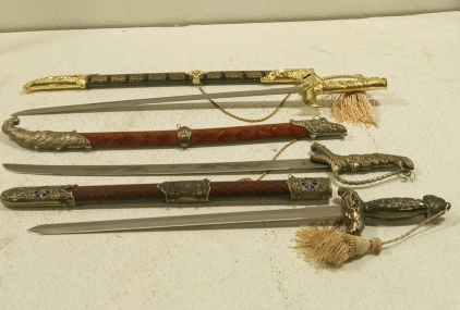 (2) Cutlass Style Swords 20in and 21in and (1) Broadsword 19in