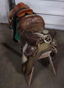(2) Assorted Sized Saddles