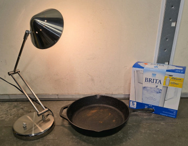 (1) Lodge Brand Cast Iron Pan, (1) Desk Lamp, (1) Brita Water System