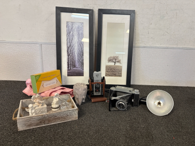 Antique Argus 75 mm Camera and Kodiak Tourist II Camera with Kodiak Flashholder Model B, Antique Angel Pill Holders, Black and White Prints, Pink Back Brace and Home Decor.