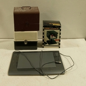 (1) Intuos Wacom Drawing Board, (1) Video Converter Kit, and (2) Metal Chest Containers