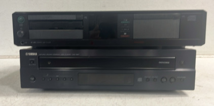 (1) Proton Compact Disc Player (1) Yamaha Natural Soind Compact Disc Player