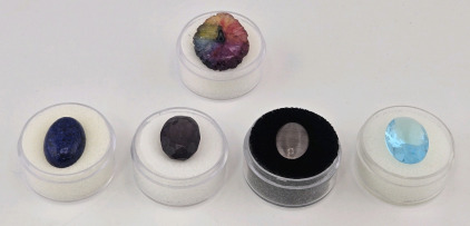 (5) Polished Gemstones: 19.50ct Rainbow Solar Quartz, 10.10ct Lapis Lazuli Blue Cabochon, 11.75ct Violet Amethyst Faceted, 2.85ct Cat's Eye Agate Grey Cabochon, 8.40ct Blue Swiss Glassfield