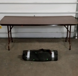 (1) Folding Table and (1) Bundle of 3 Rolls of Red Carpet