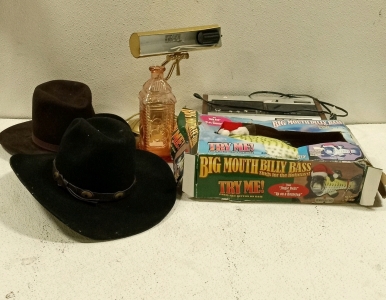 (2) Cowboy Hats, (1) Billy Bass, (1) Super scope Stero Cassette Deck, (1) Lamp, and (1) Bottle
