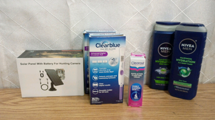 Solar Panel for Hunting/Trail Camera, (2) Clear Blue Ovulation Test, (2) Clearasil Clarifying Cream, (2) Nivea Men's Body Wash, and Whole Box Amazon Overstock