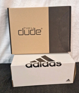 (1) Pair Of Hey Dude - Phoenix Dark Quarry Cammo Slides, Mens Size 11 & Pair Of Adidas - Adilette Shower Slides, White, Mens Size 11