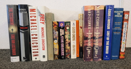 Novels In Great Condition, Including Michael Crichton, Piers Anthony, John Steinbeck, And Neil Gaiman