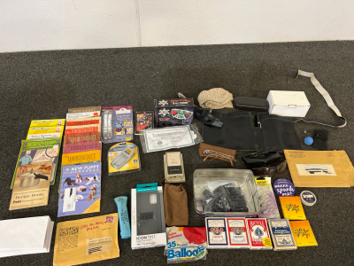 Poker Cards, Compact Travel Charger, Various Magazines, And More