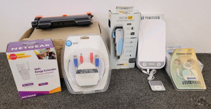 Ipod Mini, Wifi Range Extender, (2) UV Sanitazers, HP Toner Cartridges, Headphones Splitter, And Hair Clippers
