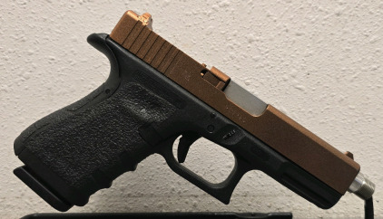 Glock 23 Gen 4 .40 Handgun, Serial RTV325, Custom Copper Finish