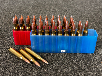 (4) Rounds Of .257 Roberts Ammo in Red and Blue Cases
