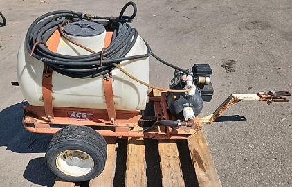 PULL BEHIND SPRAY TANK WITH PUMP AND LONG HOSE AND SPRAY WAND
