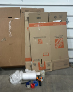 (2) Large Cardboard Boxes (1) Cardboard Clothing Cupboard (3) Rolls of Tape (2) Tape Fispensers (1) Roll of Blue Tape (1) Roll of Packing Paper (1) Roll of Bubble Wrap