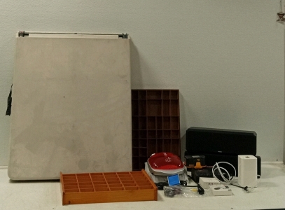 (1) Large Folding Table, (2) Wooden Organizers, (1) Large Assortment of Electronics