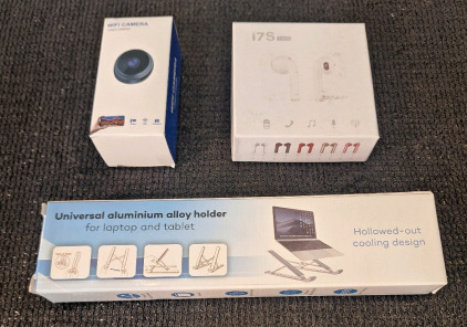 (1) WiFi Video Camera, (1) Pair Of Wireless Earbuds & (1) Universal Aluminum Laptop / Tablet Stand