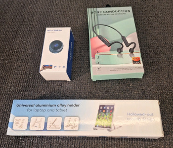 (1) WiFi Video Camera, (1) Pair Of Bone Conduction Wireless Earphones & (1) Universal Aluminum Laptop / Tablet Stand