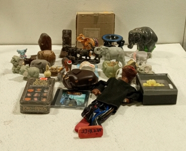 (1) Lot of Elephant Collectibles, Lord of The Rings Dominos, E.T. Doll, and More