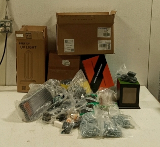 (1) Large Assortment of Spare Parts, (1) Dog Urn, (1) Honda Carburetor, and Much More