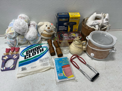 (1) sunbeam hand mixer with several attachments, was plugged in and it turns on (1) lamp tested and it works (1) pair salt shaker and pepper grinder (1) set of canning tongs (1) flower picture frame (1) small m&m holiday storage tin (1) cordless 6.0 volt 