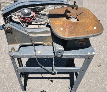 Craftsman 16-inch Variable Speed Scroll Saw, model 137.216021. This tool is designed for intricate and detailed cuts in various materials like wood, metal, and plastic.