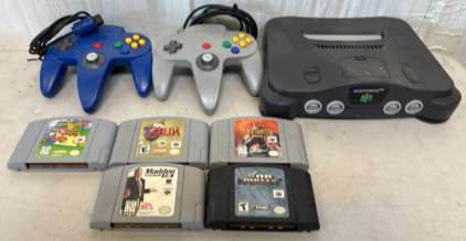 Nintendo 64, (2) N64 Controllers, & (5) N64 Games
