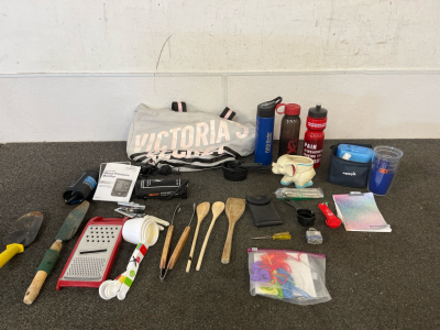 Water Pik, Blood Pressure Monitor, Kitchen Utensils, A Victoria Secret Bag, And More
