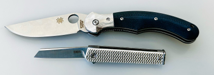 Dark Blue Handle Spyderco Folding Knife and Stainless CRKT 7083 Folding Knife