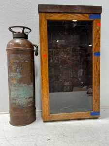 Vintage fire extinguisher and display case
