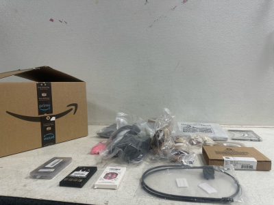 (1) Amazon box with variety of Sandals, Nails, Shirts, and more!