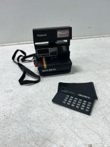 (1) Polaroid Spirit 600 CL (1) Delphi II calculator