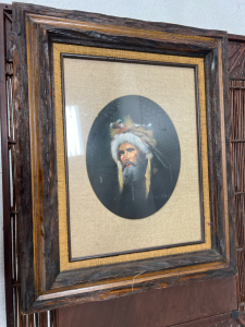 Brown mirror and picture