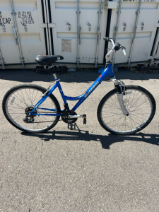 Bright blue Schwinn bike 26&rdquo;