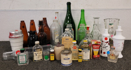 Antique Bottles Including 1887 Log Cabin Glass Bottle, Jorgensen Lotion, Vases, And More