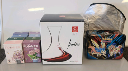 (8) "Beauty Of Flower" Buildable Flowers, RCR Invino Decanter, Pok&eacute;mon Trading Card Lunch Box, And A Car Window Shade
