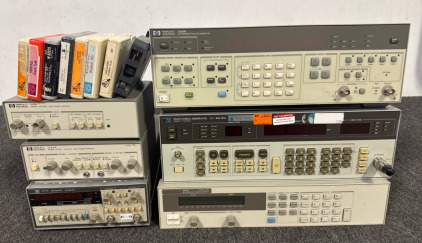HP Synthesizer/Function Generator Mod3325B, HP Signal Generator Mod8656A, HP System DC Power Supply Mod6642A, HP Universal Counter Mod5316A, HP Probe Offset Control and Power Module Mod1143A & Mod1142A, and 8-Track Tapes.