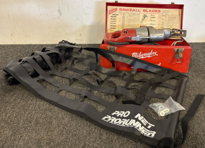 Vintage Milwaukee Heavy-Duty Sawzall Reciprocating Saw With Its Metal Case And Some Blades, New Pro Net ProRunner High Performance Tailgate Net.