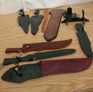 Assorted Knife Sheaths (7) and Display Stands (3)