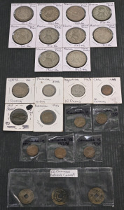 Assorted Foreign Currency Coins: Mexico Silver Pesos 1957-1963, Canada Coins 1921-1936, Kenya, Malaysia, Argentina, Chile, & Pakistan Coins