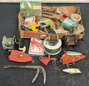 Box of Assorted Vintage Fishing Supplies: Pink Lady Dea Sea Trolling Lures, Vintage Reels, Fishing Line, & More!