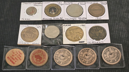 Assorted Collector Coins: Las Vegas & Denver Casino Tokens, Canada & Alaska Souvenir Coins, & Wooden Nickel Free Coffee Tokens