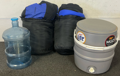 (2) Trekker Sleeping Bags, Miller Brewing Co. Cooler Drink Dispenser & 3 Gallon Water Jug
