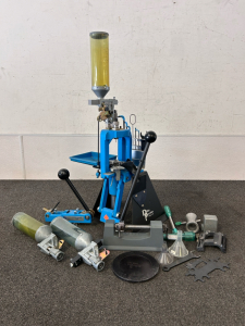 Dillon Precision Progressive Reloading Press RL550 Series With Yellow Powder Measuring Tube, Shellplate and Toolhead Area, Handle, And Black Base. Comes With Parts and Accessories.