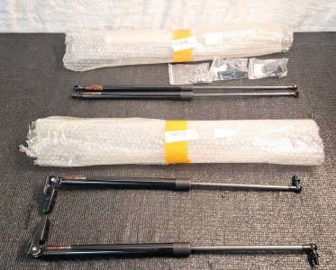 (2) 2-Piece Hood/Trunk Support Shock Sets, (1) Set 21"L, (1) Set 23"L