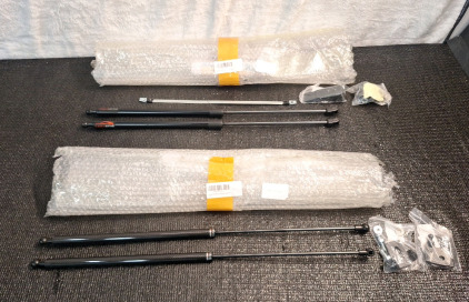 (2) 2-Piece Hood/Trunk Support Shock Sets, (1) Set 24"L, (1) Set 23"L